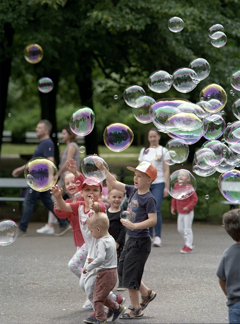 children playing bubbles